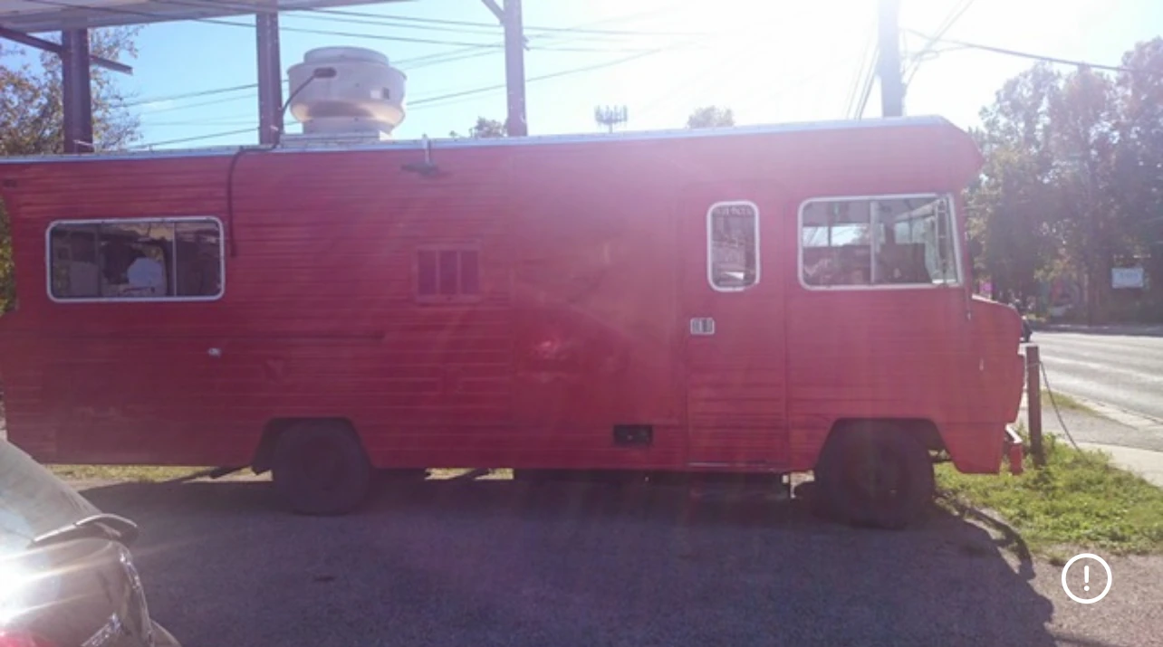 Our first truck, still red before it was painted.